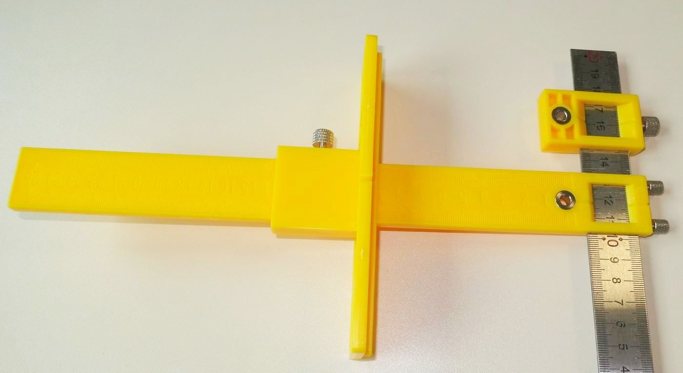 Nastavitelná šablona na vrtání